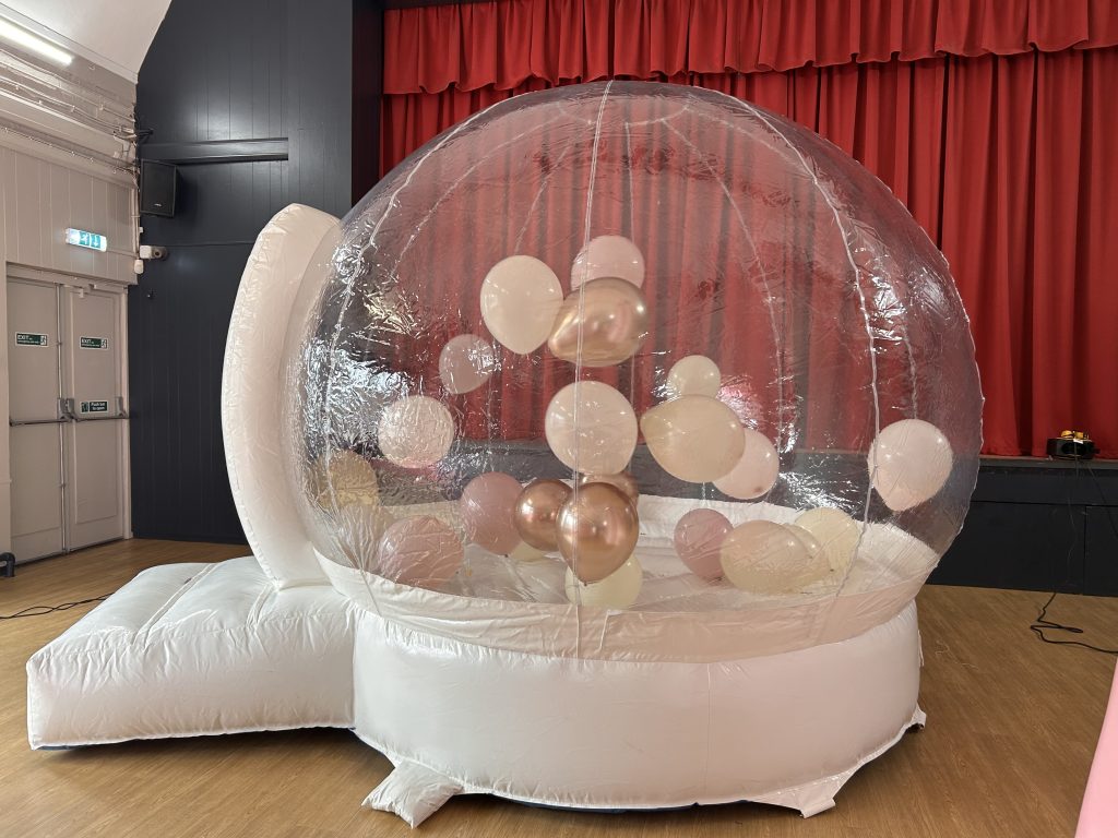 white balloon dome with pink balloons